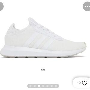 White adidas athletic sneakers